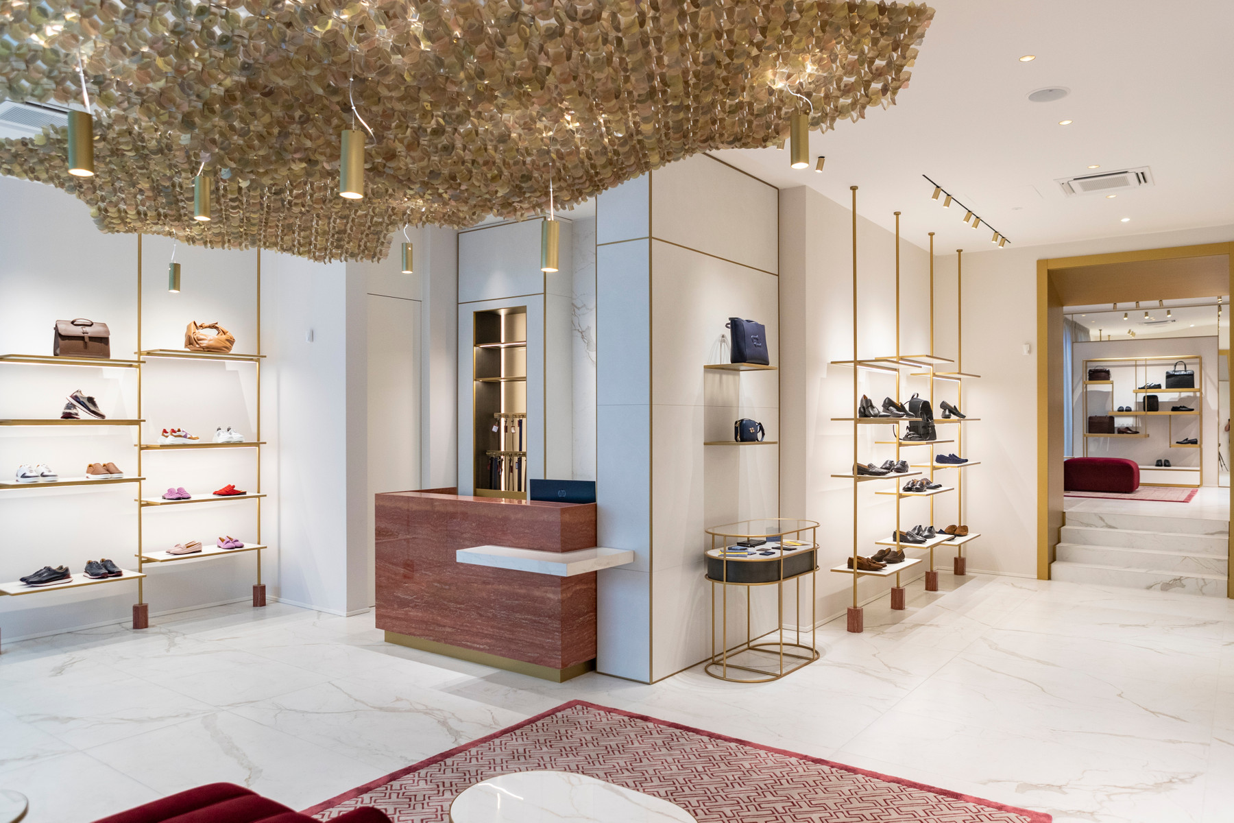 Testoni showroom elegance and a style recalling Atlas Concorde